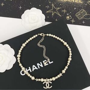 CHANEL Pearl Necklace with Gold Accents